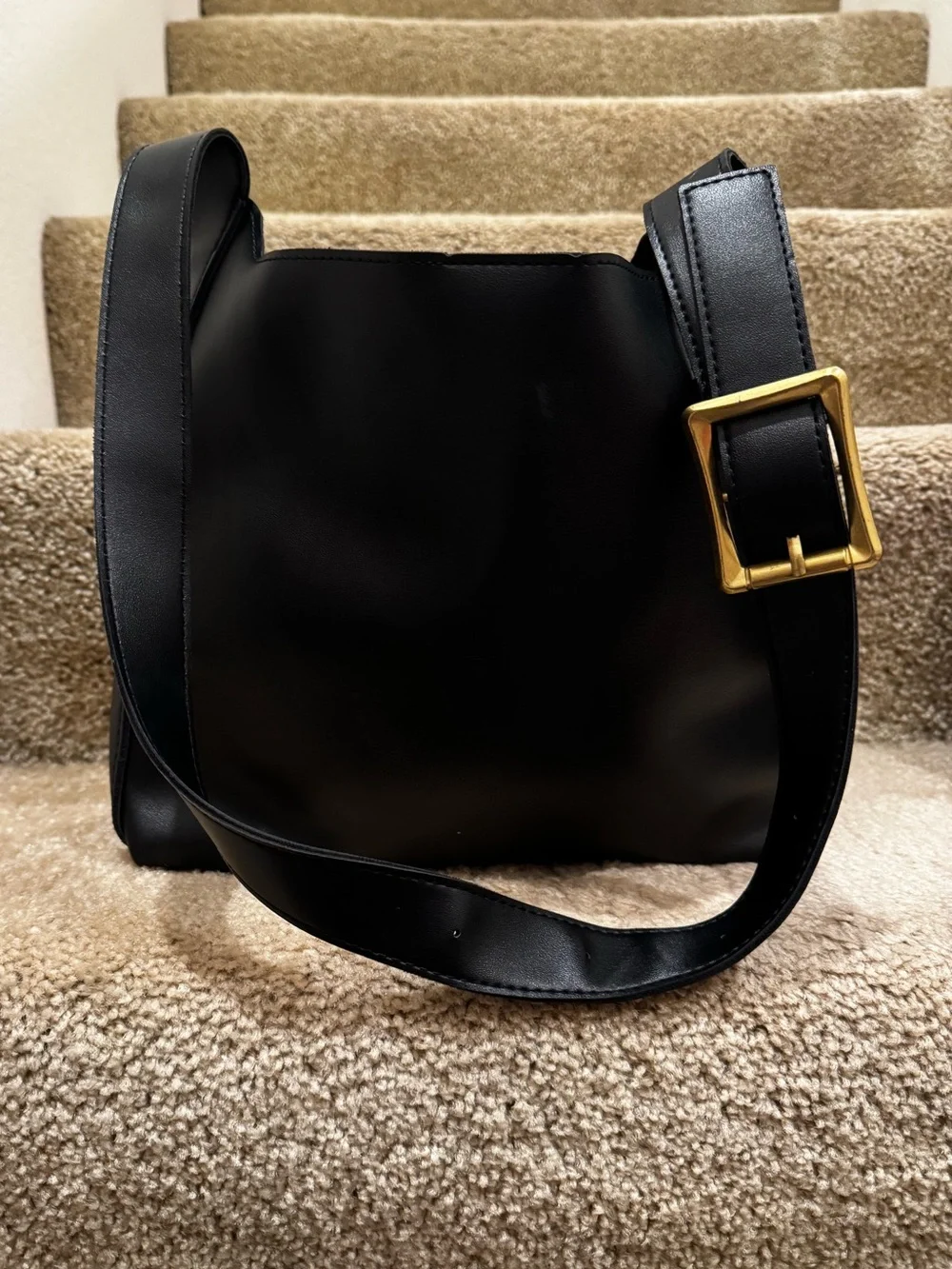 Elegant Black Leather Shoulder Bag with Gold Buckle